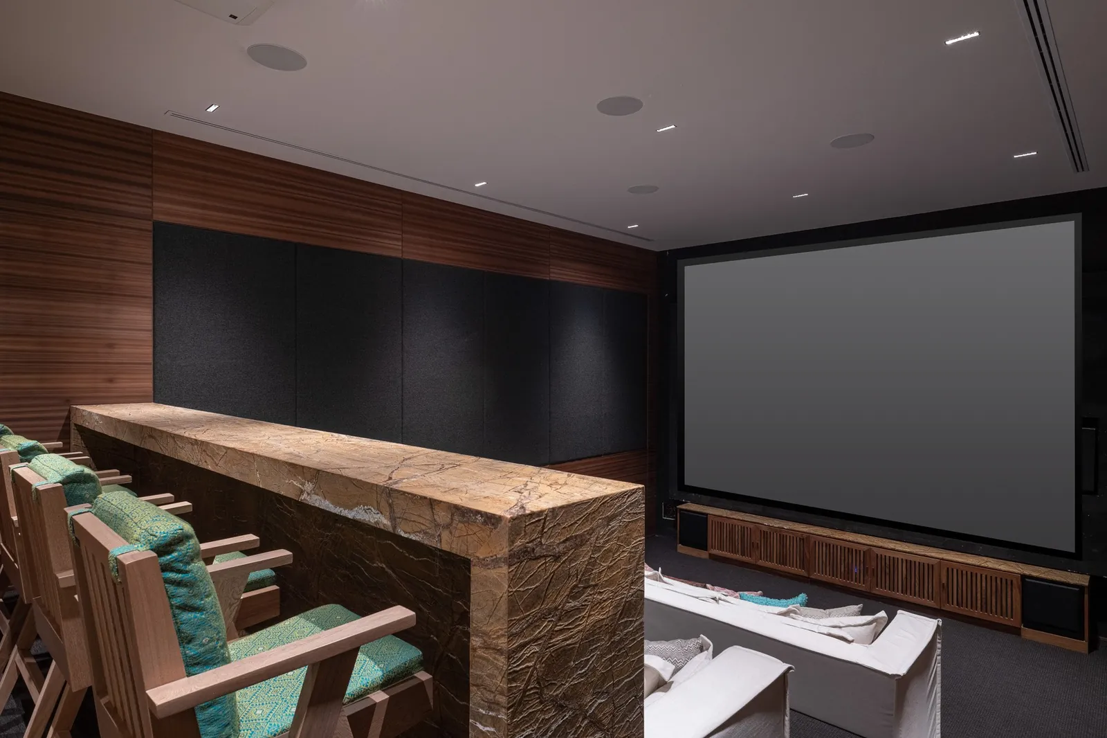 The private cinema at Casa Akai, tiered sofas for a group movie night or a presentation
