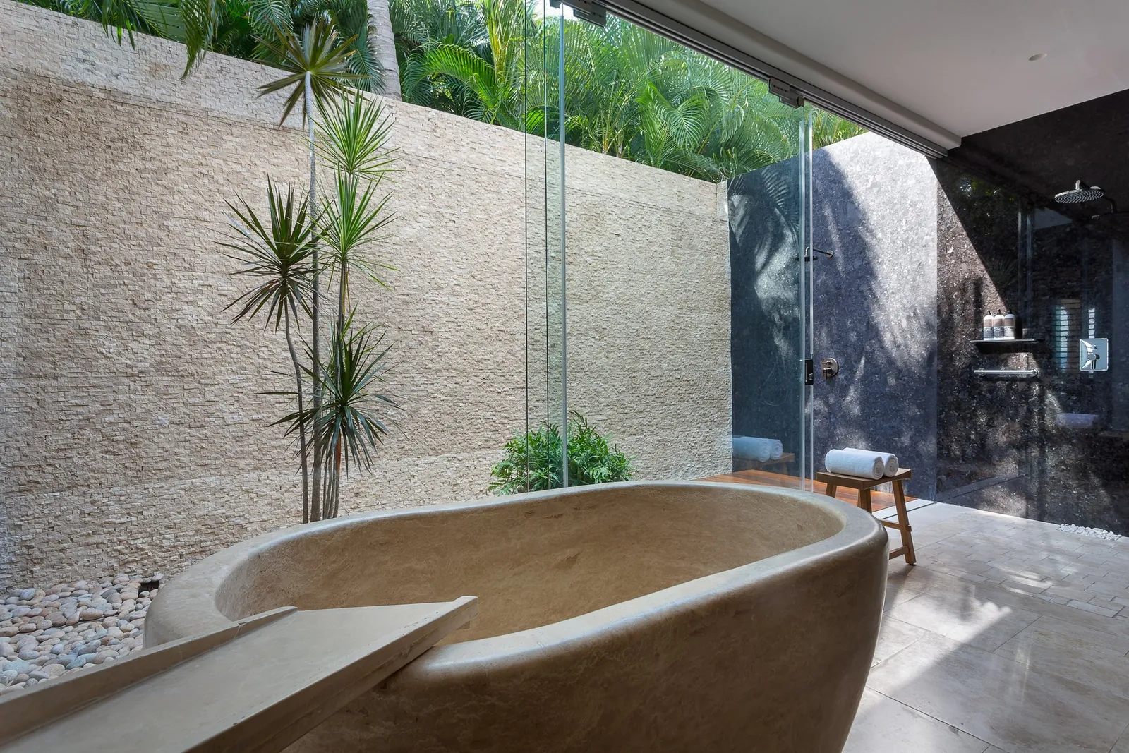 Casa La Vida, Master Suite 1: stone tub and outdoor shower in a walled garden