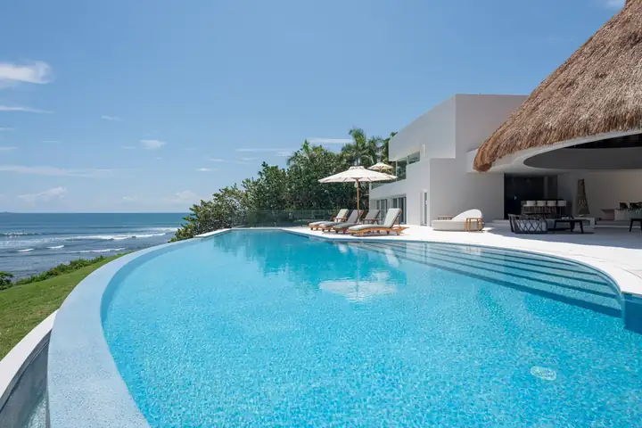 Casa Akai's clifftop lawn and infinity pool, room for the whole group facing the Bay of Banderas