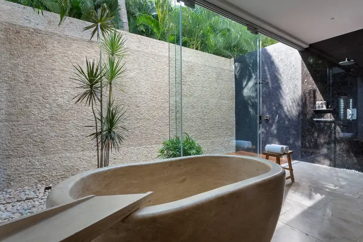 Casa La Vida, Master Suite 1: stone tub and outdoor shower in a walled garden